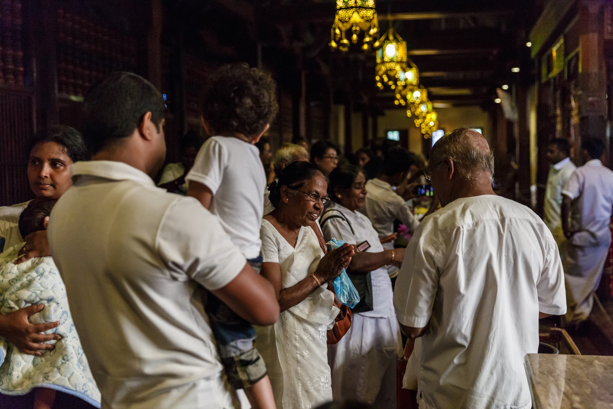 KANDY, SRI LANKA - JAN 17, 2017: hindu people in religious temple, Asia